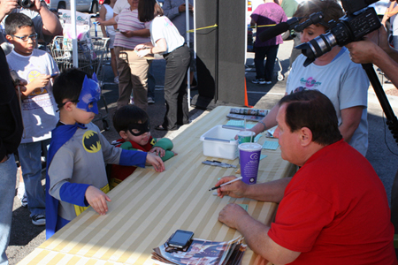 Burt autographing